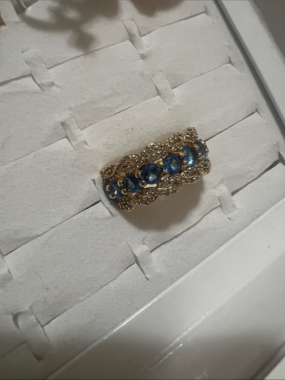 Elegant Gold Band Ring with Blue Gemstones